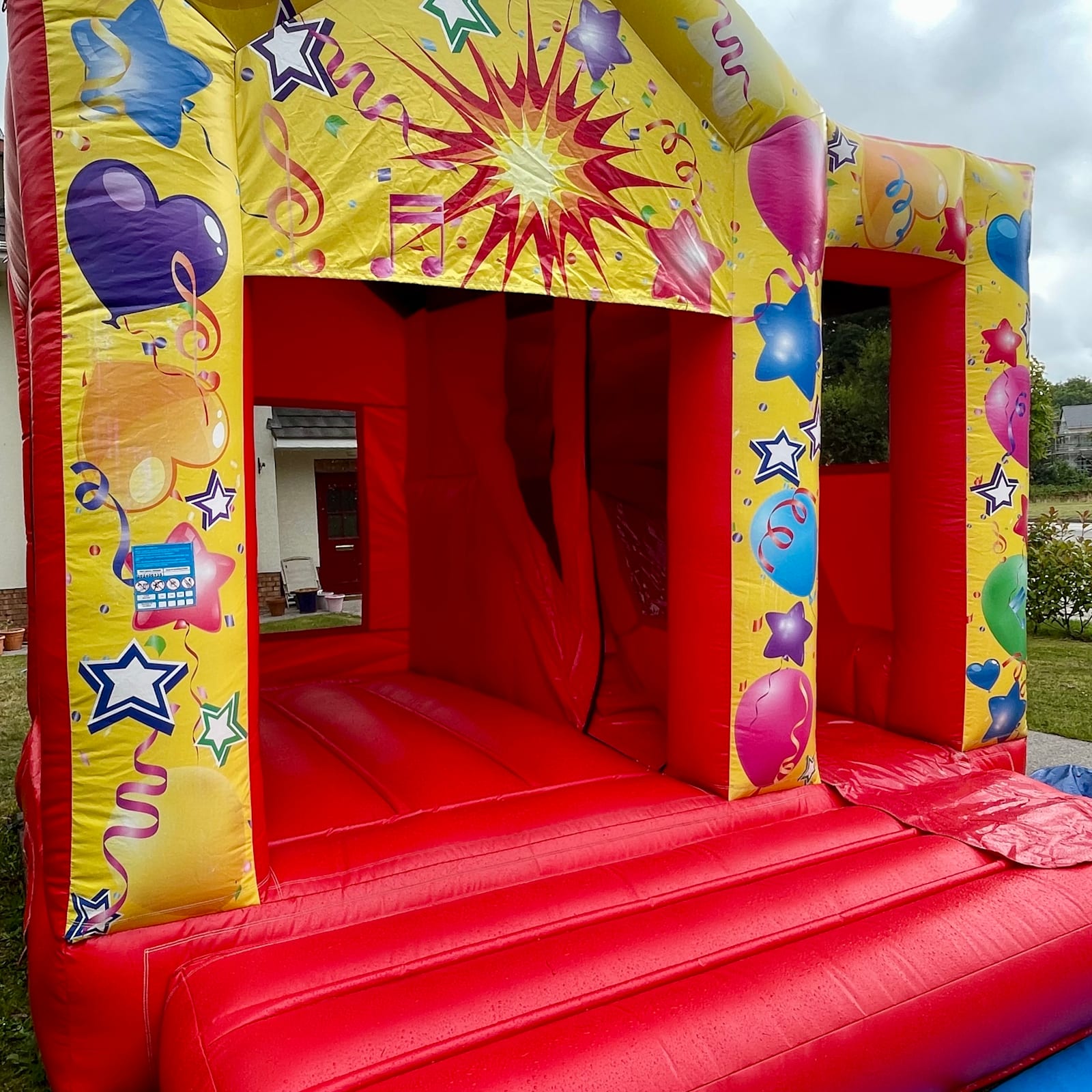 Celebration Castle with slide 12x12ft